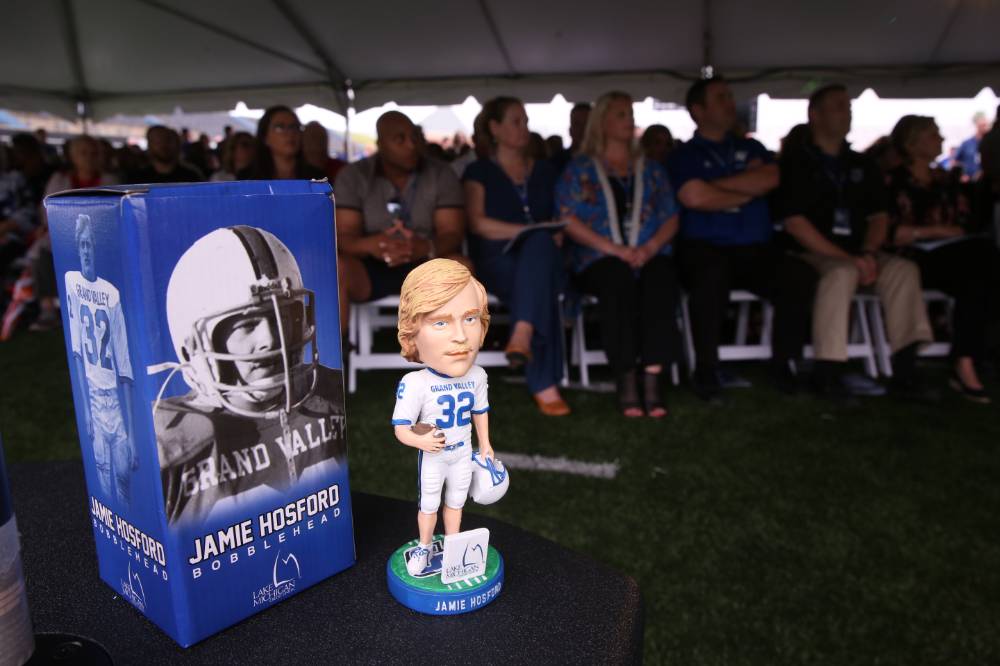 A bobblehead of Jamie Hosford sitting on a table at the Jamie Hosford Football Center dedication.